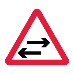 Two Way Traffic Crosses One Way Road